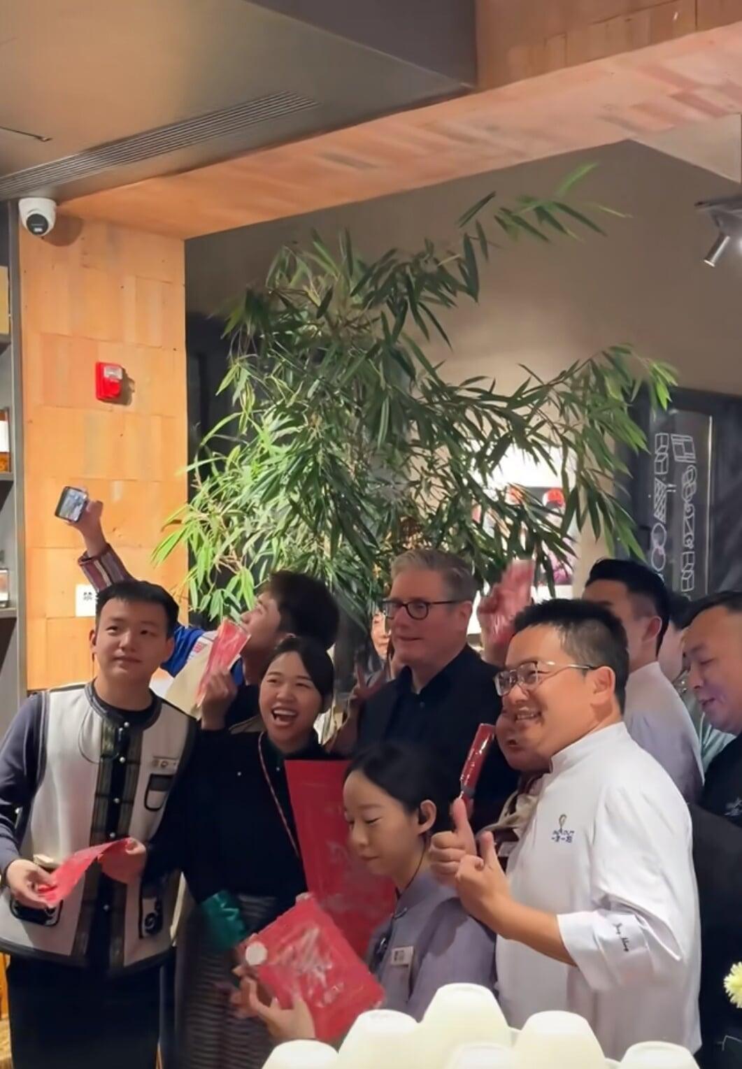 Starmer at a local restaurant in Beijing